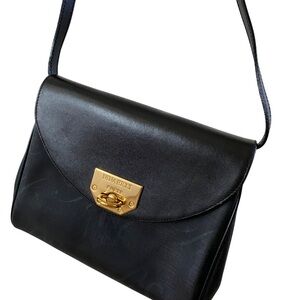 Nina Ricci Paris Black and Gold Crossbody Bag with Structured Design, clutch